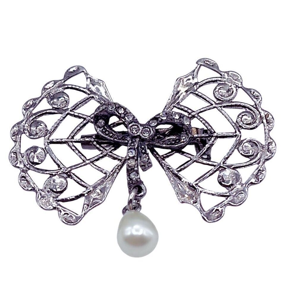 Vintage Bow & rhinestone ribbon with dangle faux pearl.